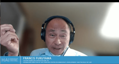Francis Fukuyama wearing headphones.