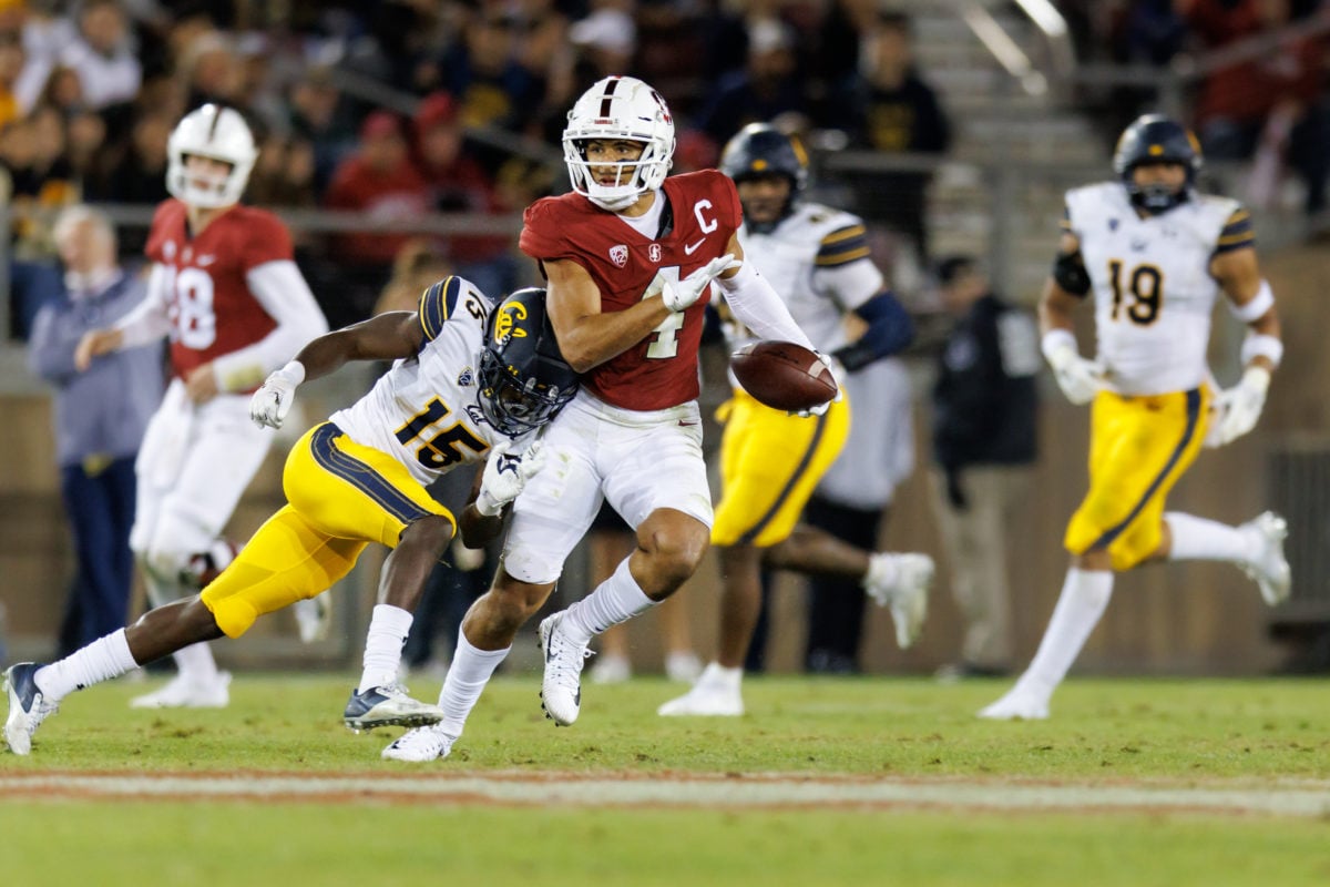 A Stanford wide receiver running in open field against Cal