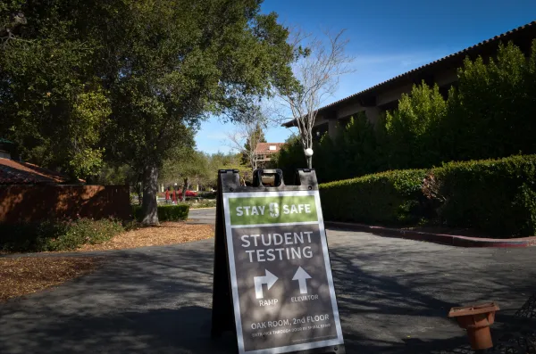 A COVID-19 testing sign on Stanford's campus