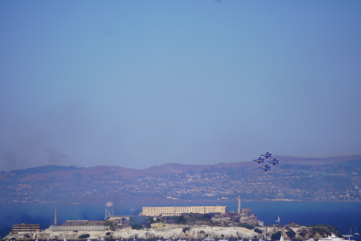 Four jets fly above Alcatraz.