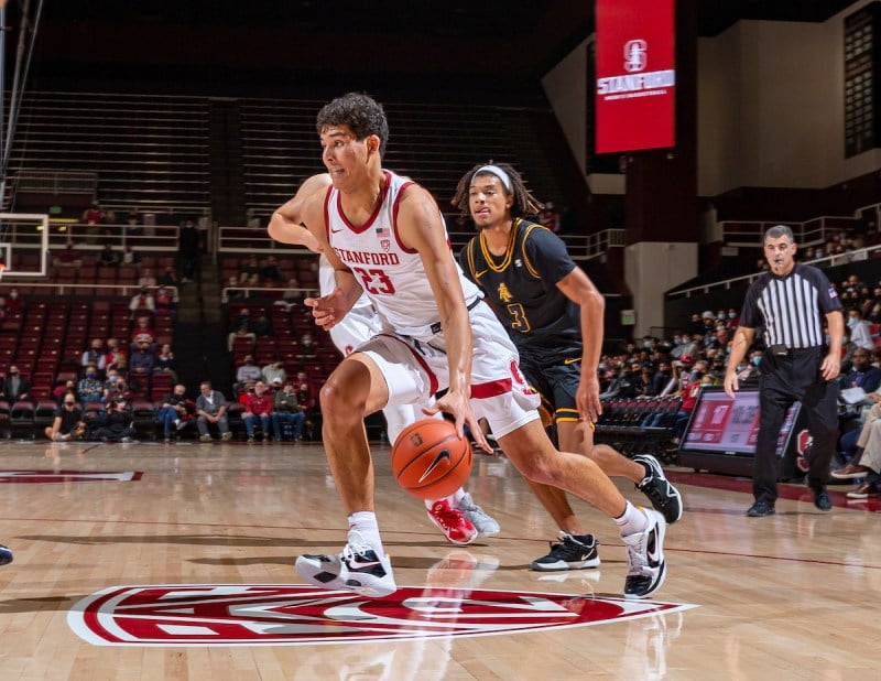Brandon Angel drives with the ball in Maples Pavilion