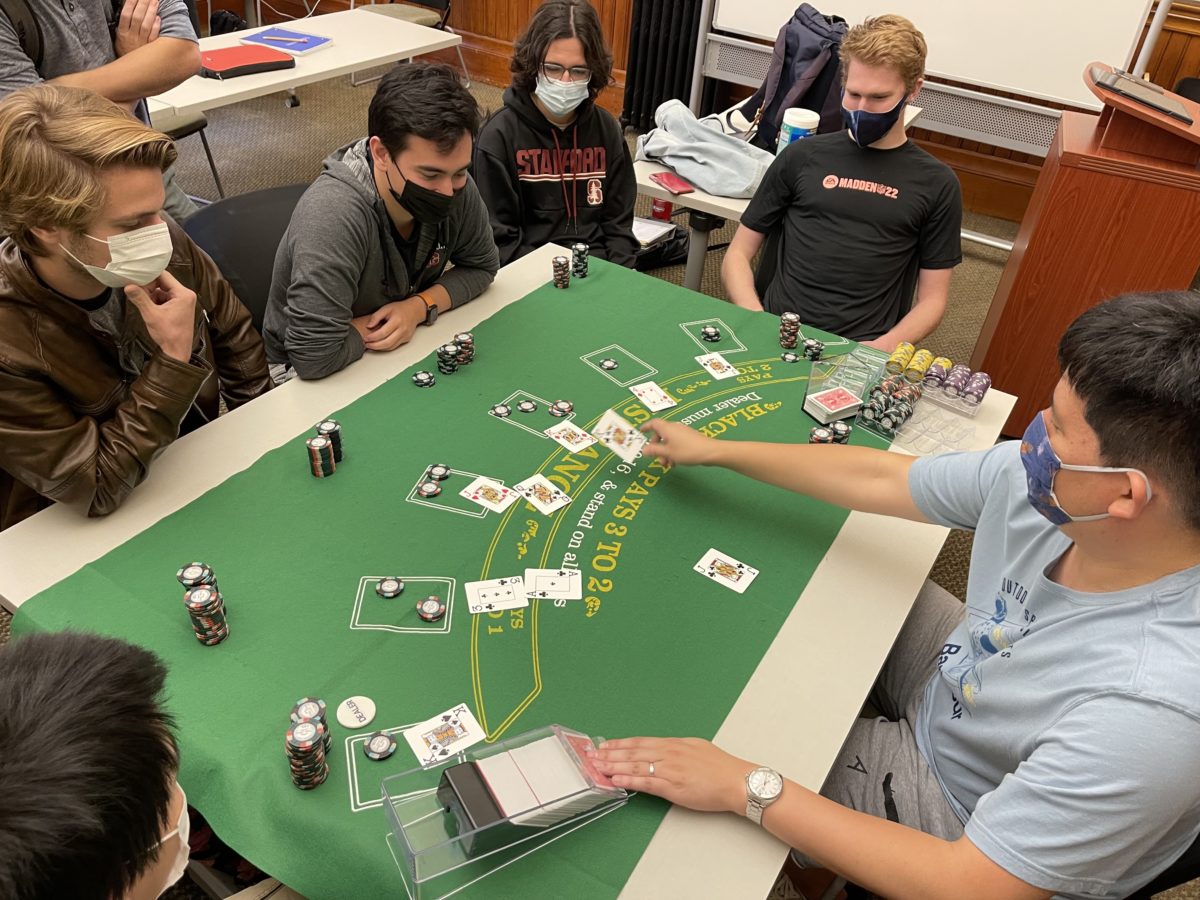 Students at the final table in the class-wide blackjack tournament 