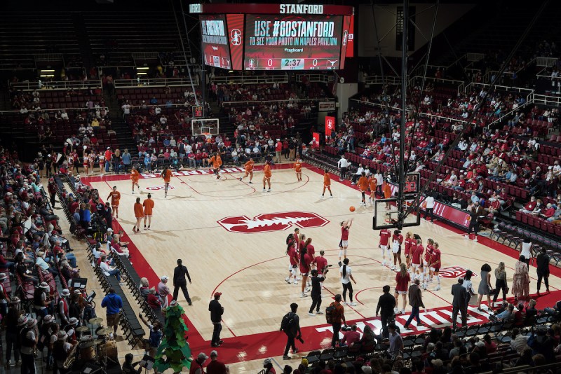 Maples Pavilion from above, while Stanford women's basketball warms up on the court.