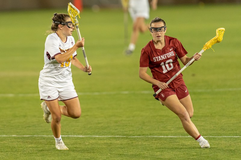 Senior midfielder Caitlin Chicoski (above, right) scored two goals in Stanford's 11-10 loss to Richmond Firday. (Photo: GLEN MITCHELL/isiphotos.com)