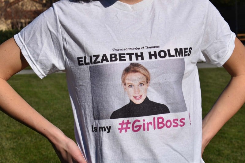 Student wearing a t-shirt “disgraced founder of Theranos Elizabeth Holmes is my #GirlBoss!”. (ULA LUCAS / The Stanford Daily)