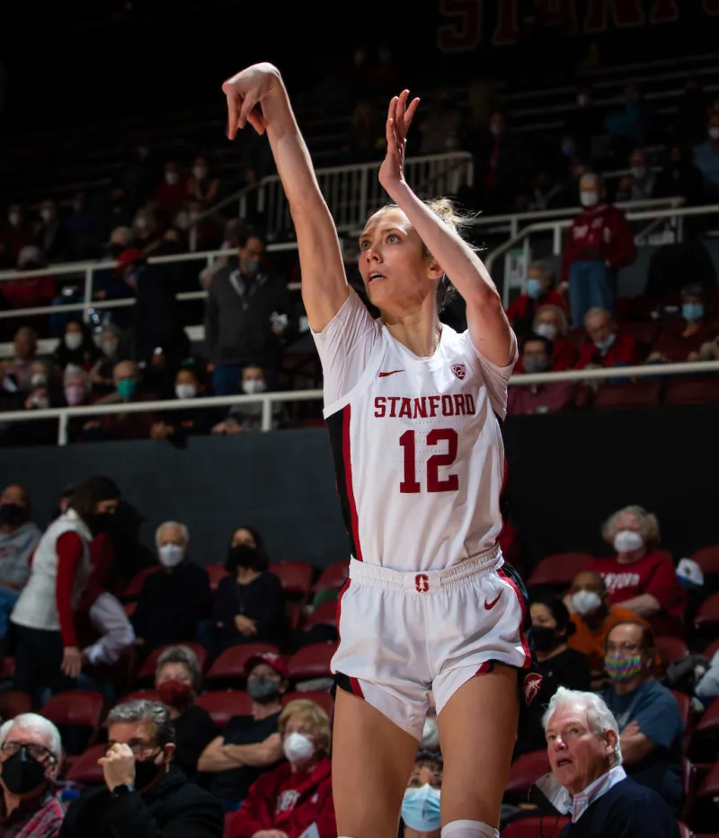 Lexie Hull follows through after shooting the ball in Maples Pavilion.