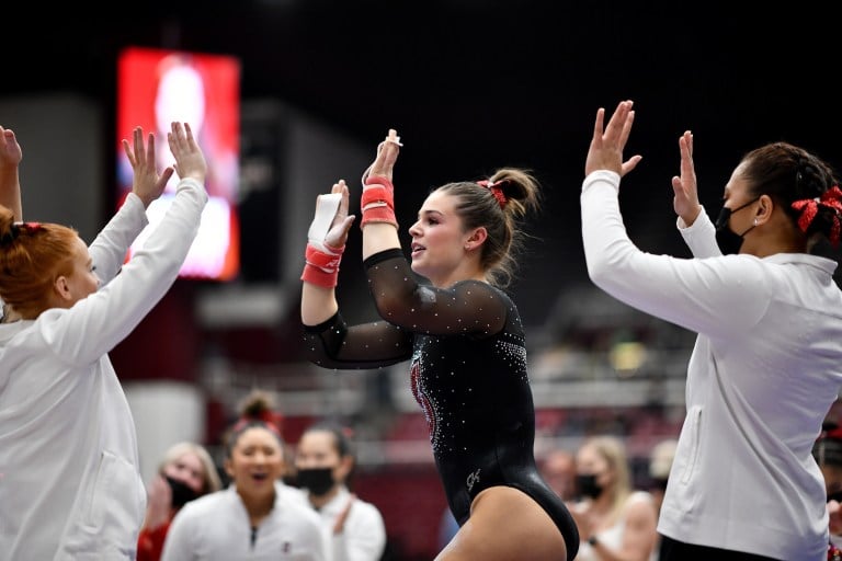 Senior Madison Brunette celebrates after a routine.