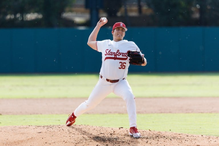 Freshman pitcher Ty Uber winds up to pitch.