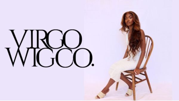 Promotional poster of Virgo Wig Co. The text "Virgo Wig Co." is headlined in black and sleek font, Linda Denson sits in a white dress on a wooden chair