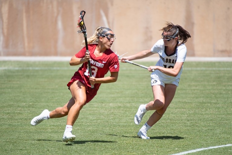 Fifth year attacker Ali Baiocco runs past a defender.