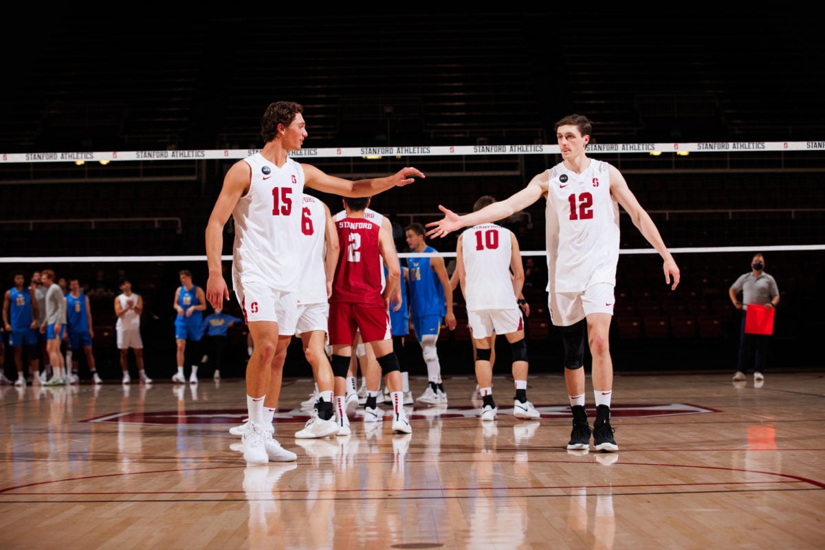 Juniors, OH Will Rottman and setter Nathan Lietzke, celebrate on March 11, 2022 in Maples. The duo has proven to be a lethal pair on the Cardinal attack.