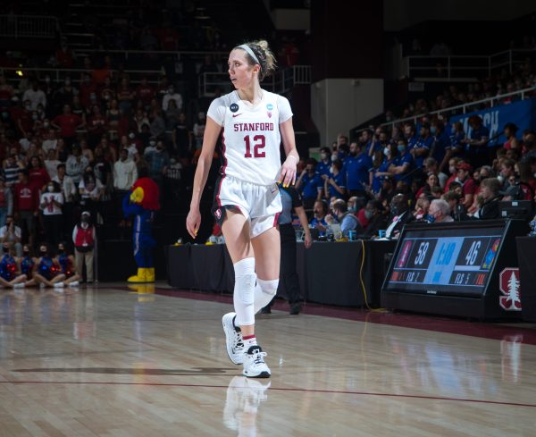 Stanford guard Lexie Hull scans the court.