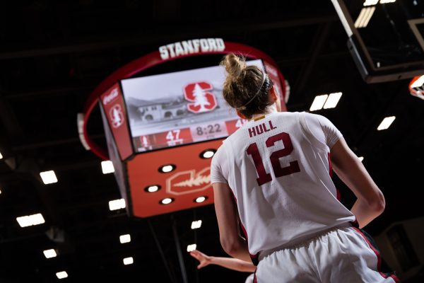 Lexie Hull looks up at the scoreboard.