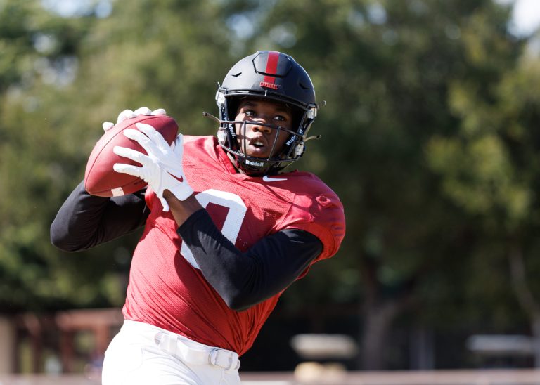 Freshman wide receiver Mudia Reuben looks down the field following a catch at practice.