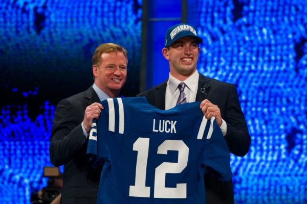 Roger Goodell and Andrew Luck pose together at the NFL Draft in 2012.