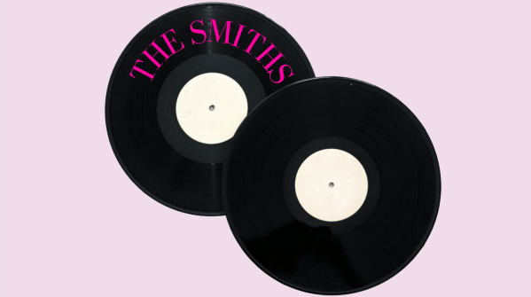Vinyl records over a light pink background. On the record is says "The Smiths" in dark pink.