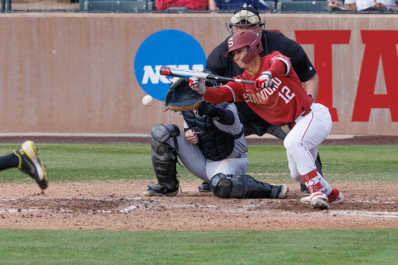 Tommy Troy bunts during a game against Oregon State.