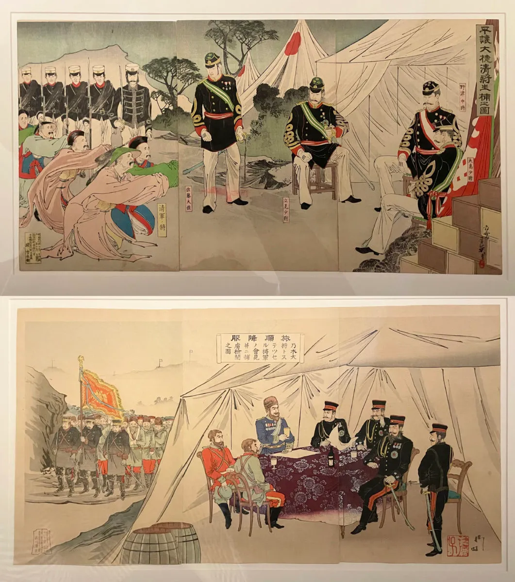 Top image has the captured chinese generals pleading on the ground in front of the camp where the japanese generals, dressed in long-sleeved black tops, white pants, landyard and caps. Towards the left a line of soldiers holding guns upwards also loom ominously.

The lower image sees the captured white generals sitting on the chairs discussing with the japanese generals inside the camp, sheltered and well seateed. Rows and rows of prisoners of war are towards the left outside the tent where the generals are. The prisoners of war march behind the japanese solder holding up a flag of victory.