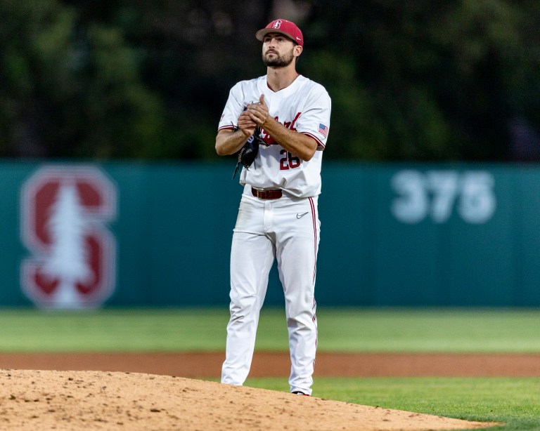 Alex Williams stands on the mound before pitching.