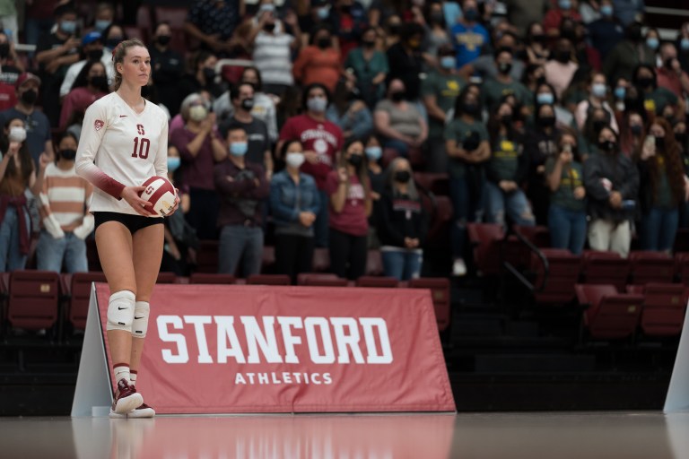 Kendall Kipp waits to serve the volleyball.