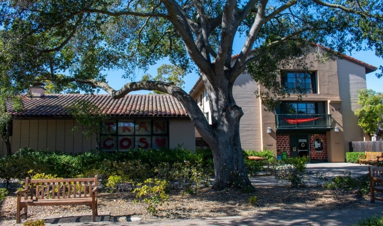 picture of the exterior of trancos, a dorm in Wilbur hall, which has a big tree in front of its entrance