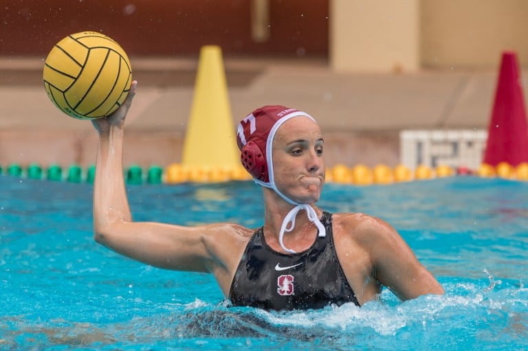 Makenzie Fischer rises out of the water looking to score