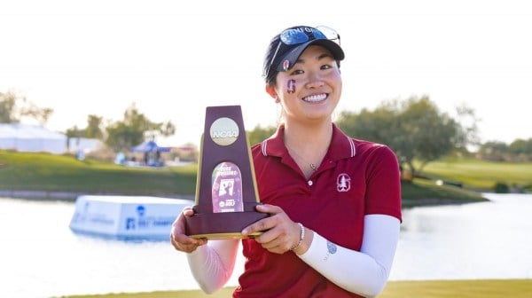Freshman Rose Zhang smiles with her trophy