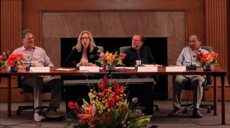 Larry Diamond, Kathryn Stoner, Erik Jensen and Francis Fukuyama sit behind a panel table