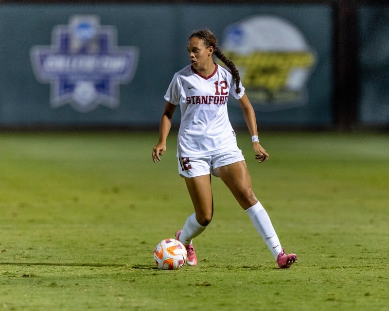 Freshman midfielder Jasmine Aikey dribbling the ball on Sept. 1 against No. 8 Penn State. In her most recent performance, she saved the Cardinal with a goal in the 88th minute. (Photo: John Lozano/ISI Photos)
