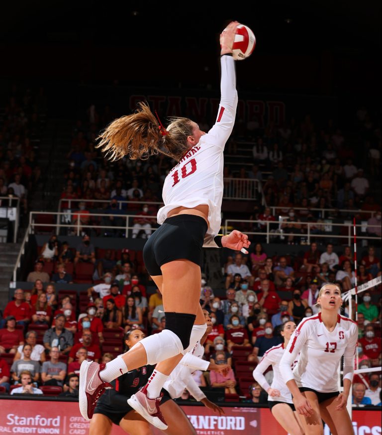 Kendall Kipp jumps to make a kill.