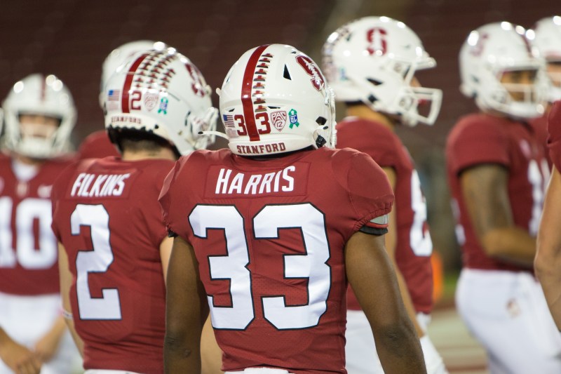 Running backs Arlen Harris Jr. and Casey Filkins warm up before the game against Oregon earlier this season. (Photo: AL CHANG/isiphotos.com)