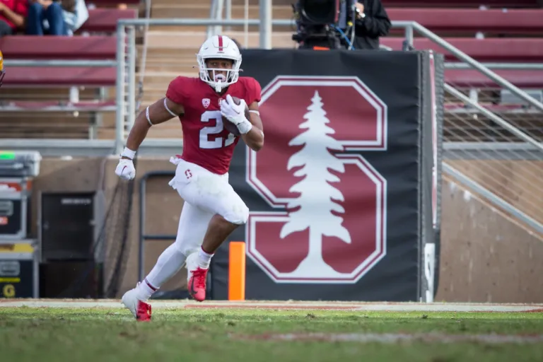 Caleb Robinson runs in the open field