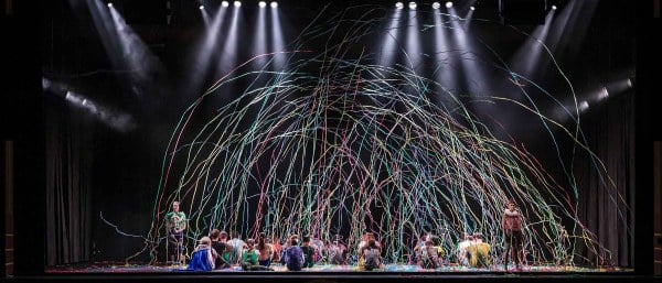The 36 performers of “Leviathan by Circa” sat with their backs to the audience while a rain of streamers were shot out from both sides of the stage. The production featured impressive acrobatic choreography that spoke to the theme of community. (Photo courtesy of Johannes Reinhart and Stanford Live)
