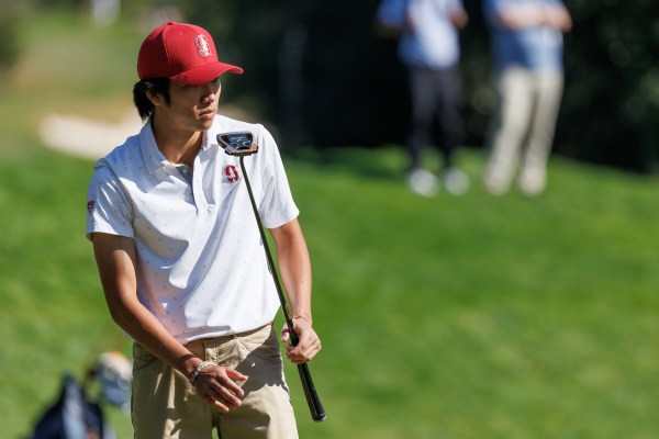 Fifth-year Ethan Ng stares down the fairway during an invitational last spring. Ng and the men's golf team teamed up with the women's side to beat Cal in a mixed-gender event. (Photo: BOB DREBIN/isiphotos.com)