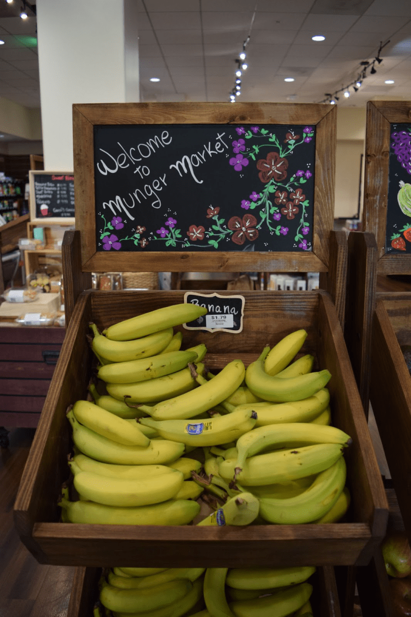 Bananas at Munger Market in a wooden crate