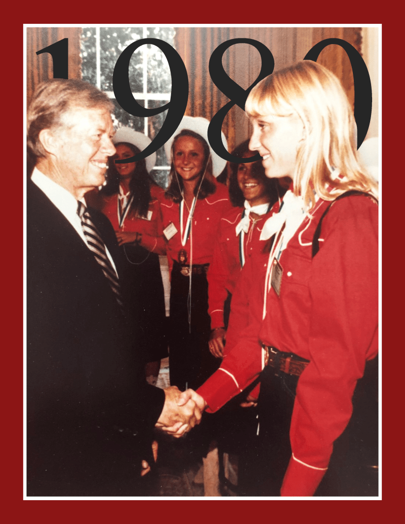 U.S. President Jimmy Carter shakes hands with members of the 1980 Olympic swim team at a photo reception in Washington, D.C.