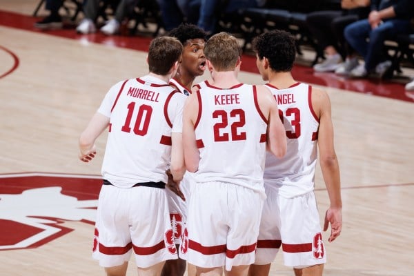 Members of the Stanford men's basketball team during a game against Colorado on Feb. 19, 2022. The Cardinal kick off their season next Monday versus Pacific. (Photo: BOB DREBIN/ISI Photos)