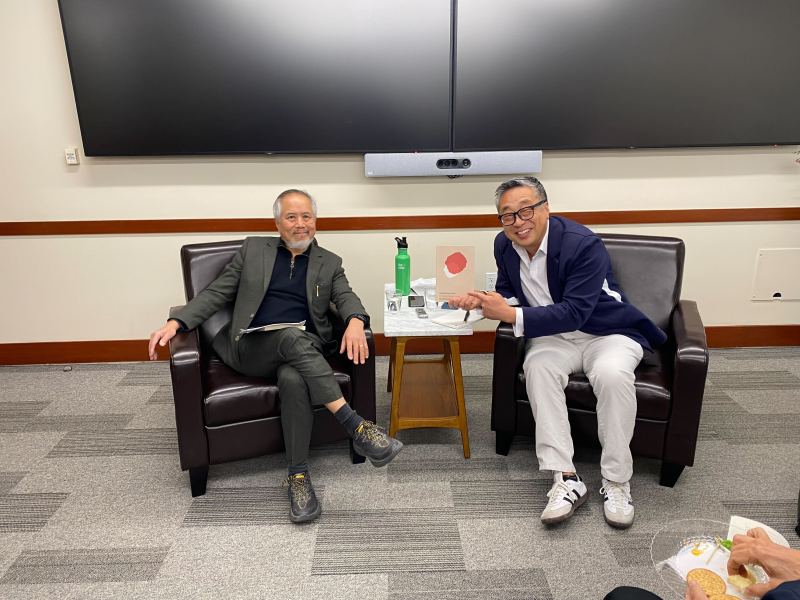 David Palumbo-Liu and David Kyuman Kim photographed sitting in armchairs