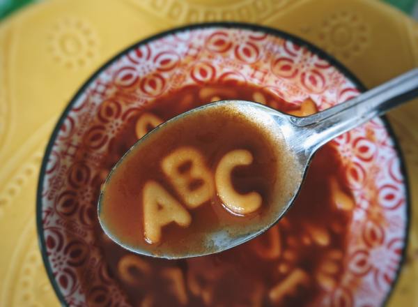 Alphabet soup, with the letters A, B, and C in the spoon