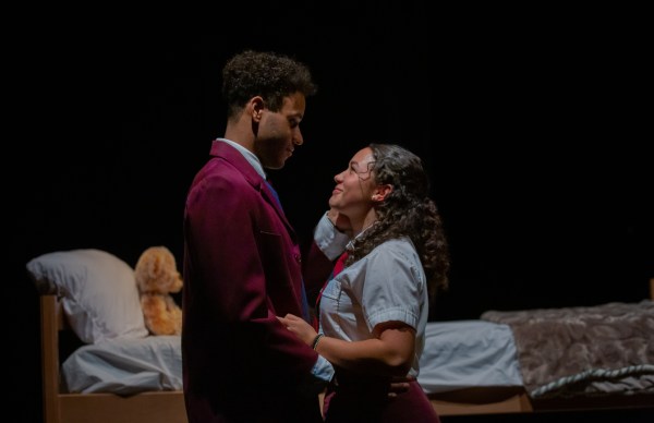 Actors Dylan Moore and Aliyah Lipsky stare into each others' eyes in BLACKstages' "Pipeline."