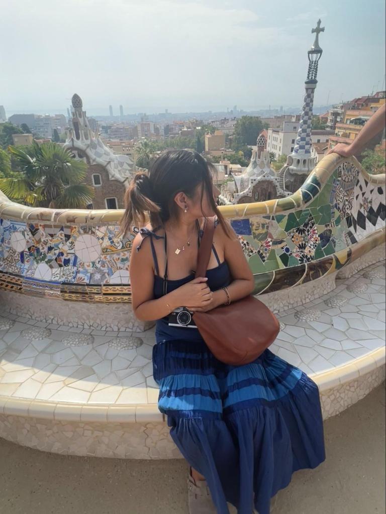 Catherine Sarca wearing her favorite blue dress against the Dublin skyline.