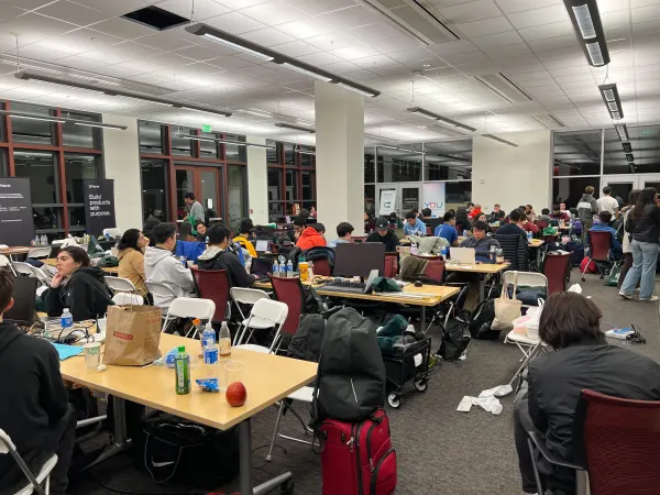 Participants of the 2023 Tree Hacks coding late at night in the Jen-Hsun Huang Engineering Center basement