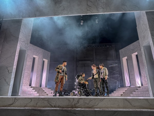 Four actors stand between pillars and smoke in the department of Theater and Performance Studies' production of "Julius Caesar."