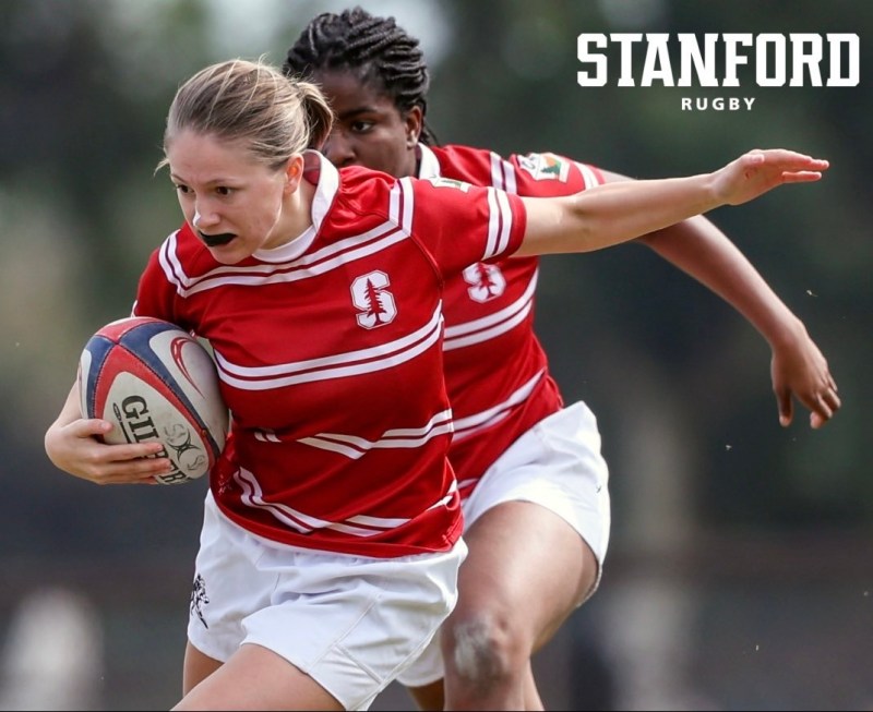 A Stanford rugby player running with the ball