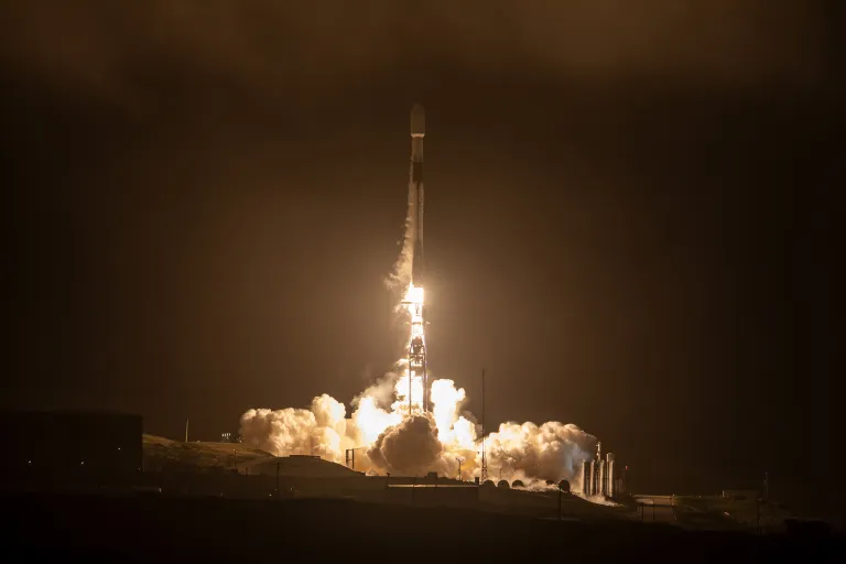 A rocket launching at night