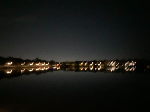 Lake Lag at night. The lights on the shore are blurry.