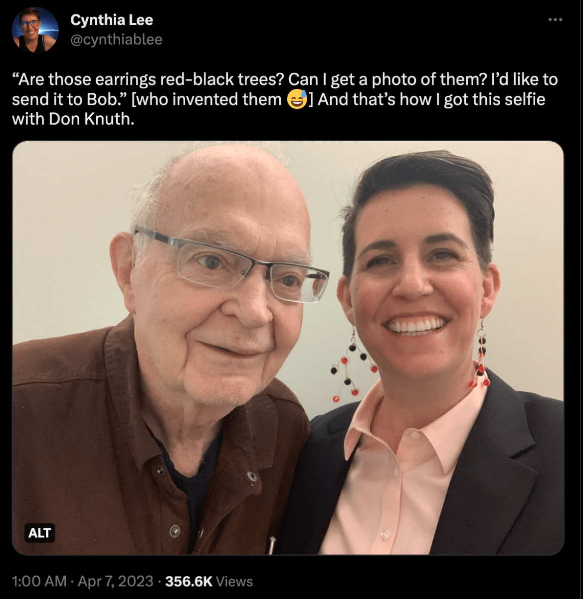 A tweet from Cynthia Lee meeting Donald Knuth. Lee is wearing the red-black tree earrings.