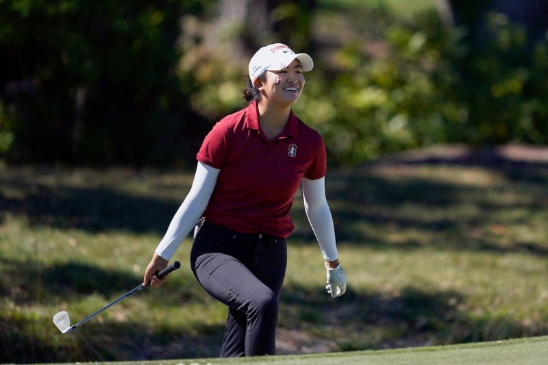 woman golfer celebrates on the golf course