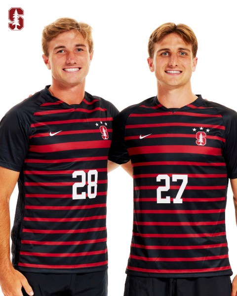 Palmer and Fletcher pose in their Stanford uniforms, which are patterned with red and navy stripes.