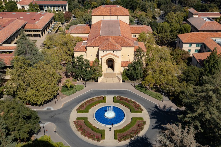 The fountain sits in front of Memorial Auditorium on a bright day.